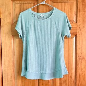 Women’s size small gently used Love Fire light teal green shirt sleeved top